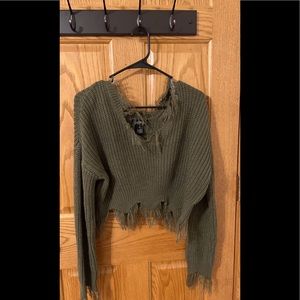 Green cropped distressed sweater. Just Polly size medium.